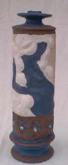 Tall Relief Portrait Slab and Thrown Vase